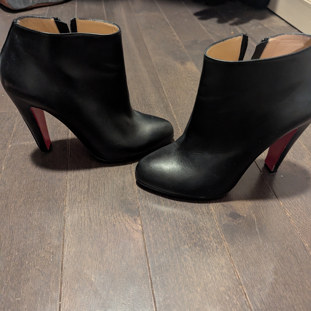 Christian Louboutin Black Heeled Boots with Red Soles